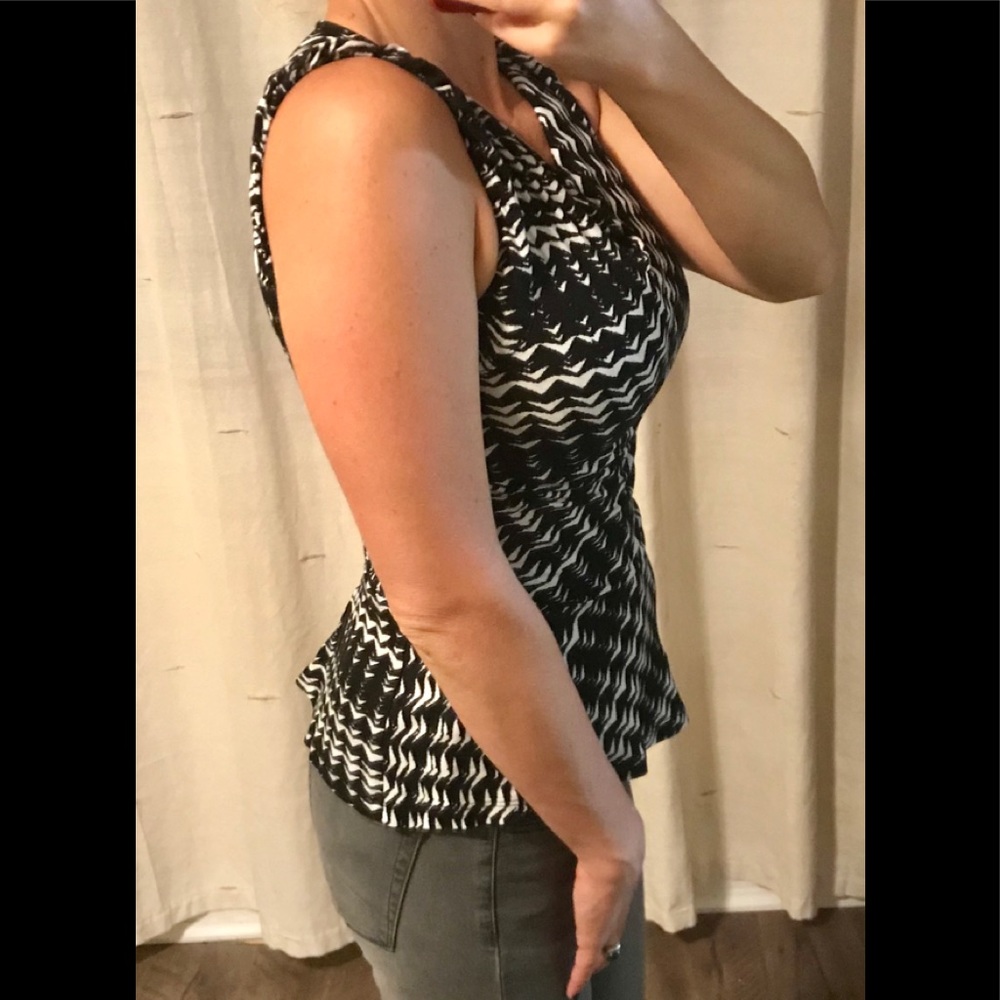 Ann Taylor peplum top. Size xs.